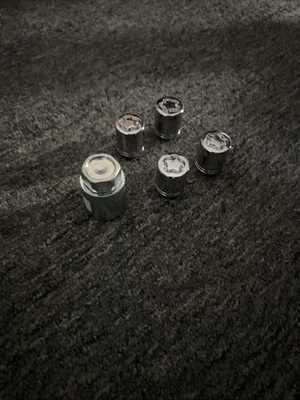 JUEGO DE BLOQUEO DE RUEDA NISSAN FABRICANTE DE EQUIPOS ORIGINALES para modelos Altima rogue T99W2-A7010 ENVÍO GRATUITO Foto 1 de 4