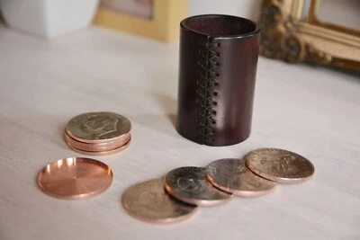 John Ramsay's cylinder leather stack of coins single coins and shell Eisenhower - Image 1 of 4