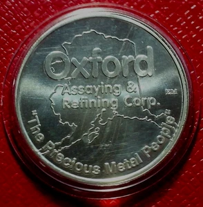 Oxford Assaying & Refining Corp. Ronda 1 oz Troy..999 plata en cápsula - Imagen 1 de 4