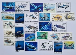 Collezione 25 squali diversi su francobolli - Foto 1 di 1