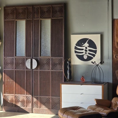 Puertas talladas en panel de Sherrill Broudy, Evelyn Ackerman Foto 1 de 4