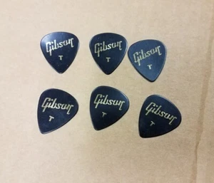 Lot of 6 Gibson Black /Gold Foil Thin gauge Guitar Picks  - Picture 1 of 2
