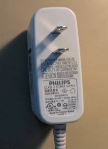 Philips Class 2 Power Supply AC/DC Adpter Model # HE10S010QU0900110 Output : 9V. - Picture 1 of 4