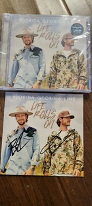2021 FLORIDA GEORGIA LINE LIFE ROLLS ON SIGNED SEALED CD & BOOKLET BRIAN KELLEY - Picture 1 of 1