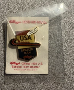 Mini trigo esmerilado Kellogg's 1992 Juegos Olímpicos de Estados Unidos Equipo de bobsled Booster Tac Pin - Imagen 1 de 2