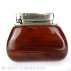 TISCHFEUERZEUG rotes Faturan ( Bakelit Bernstein ) Emanuel August Merck 1920er