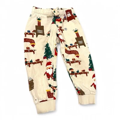 Pantalones deportivos de Navidad H&M Jaggers pantalones de vacaciones Santa Elves Polo Norte 2T Foto 1 de 4