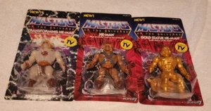 Masters of the Universe Super7 HE-MAN, TRANSFORMIERENDE & GOLDENE STATUE HE-MAN - Bild 1 von 4