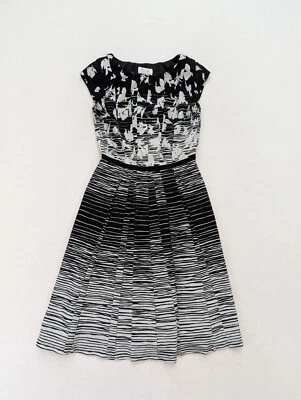 Vestido para mujer Elle talla XS negro gris estampado floral calce y acampanado midi elástico Foto 1 de 4