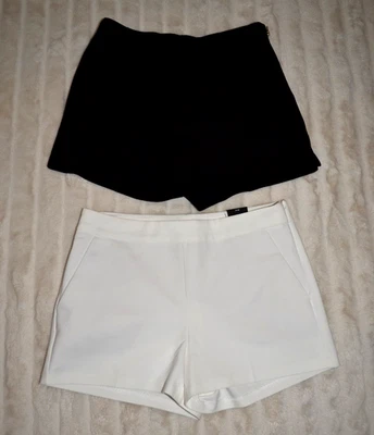 LOT of 2 Express/Dynamite stretchy Black & white short shorts, sz 4 p/s - Image 1 of 4