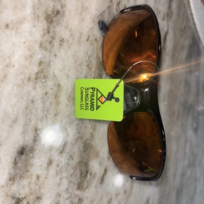 Gafas de sol piramidales marco negro con lentes naranjas unisex Foto 1 de 4