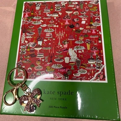 Rompecabezas de mesa de fiesta Kate Spade NY 500+ piezas con regalo monedero encanto llavero Foto 1 de 4