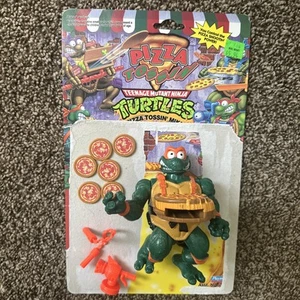 De colección (1993/1994) Playmates TMNT Pizza Tossin Mike con tarjetero (completo) - Imagen 1 de 9