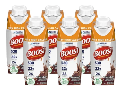 Bebida nutricional muy alta en calorías chocolate hecha con sabor a chocolate natural Foto 1 de 4