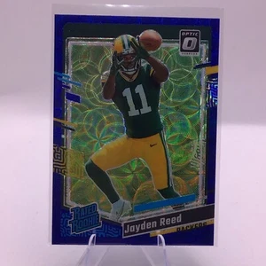 2023 Panini Donruss Optic Rated Rookie Blue Scope Prizm #239 Jayden Reed RC - Picture 1 of 2