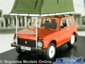 MODELO DE COCHE LADA NIVA CON TECHO CARPA ROJA AUTOCARAVANA CÁMPER TALLA 1:43 IXO 1981 IST T - Imagen 1 de 5