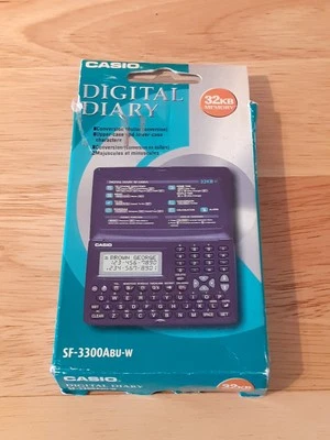 Vintage CASIO Digital Diary SF 3300Abu W 32KB Boxed  Excellent Condition - Image 1 of 4
