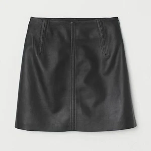 H&M Premium Qualität kurzer Echtlederrock in schwarz Gr.EUR 32 US 0 - Bild 1 von 3