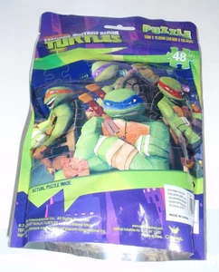 Teenage Mutant Ninja Turtle Puzzle unterwegs 48 Teile Alter 5 plus versiegelt neu im Beutel - Bild 1 von 5