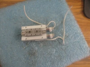 SMC Model: MHF2-12D1 Low Profile Gripper with (2) D-M9B Sensors.  - Picture 1 of 3