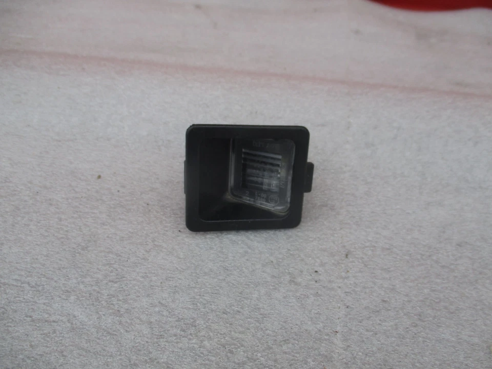 2022-2025 NISSAN FRONTIER LUZ MATRÍCULA TRASERA IZQUIERDA OEM LADO DERECHO Foto 1 de 4