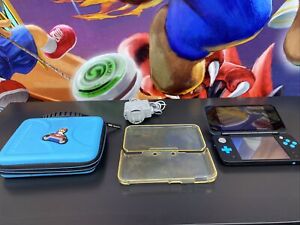 NINTENDO 2DS XL GAME CONSOLE BLUE AND BLACK WITH CASES