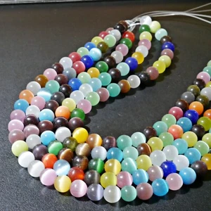 NELLYS 1 Strang Glasperlen Katzenauge bunt 10mm Cat Eye 39 Perlen