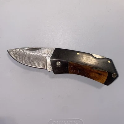 COLT FAUX DAMASCUS LOCKBACK FOLDING POCKET KNIFE Wood And Antler Handle - Image 1 of 4