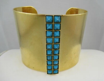 Brazalete ancho Sorrelli firmado tono dorado con detalles de color turquesa Foto 1 de 4