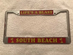 SOUTH BEACH "LIFE'S A BLAST" Kennzeichenrahmen. Metall. Neu. - Bild 1 von 1