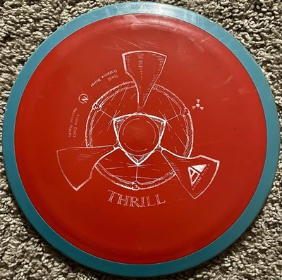 Axiom Thrill Patent Pending 174g Red Plate, Blue Rim - Image 1 of 3