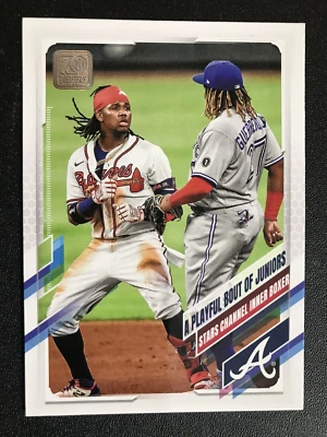 2021 Topps #61 A Playful Bout of Juniors Acuna Jr Guerrero Jr - Image 1 of 2