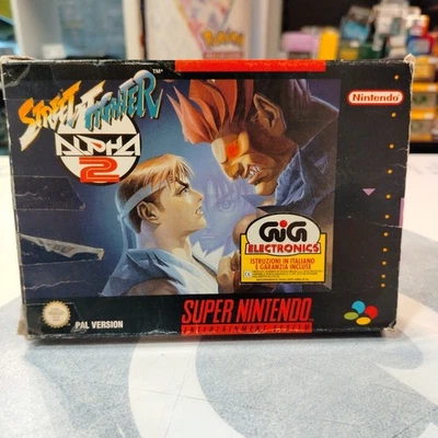 Street Fighter Alpha 2 GIG Super Nintendo SNES Senza Manuale Senza Interni - Immagine 1 di 4