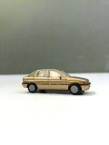 Praline 5701 Ford Escort Ghia Gold 1/87 Scale