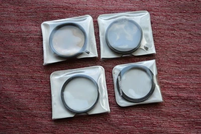 3 Tiffen 55mm filters (Center Spot, Polarizer, Vari-Burst) + step-down to 49mm - Image 1 of 3