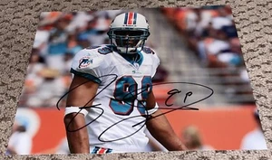JASON TAYLOR SIGNED 8X10 PHOTO MIAMI DOLPHINS FOOTBALL AUTOGRAPH AUTO - Picture 1 of 1
