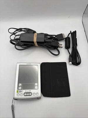 Sony Clie PEG-TJ25/U Touchscreen W/Box, Charger & Stylus For Parts Read - Image 1 of 4