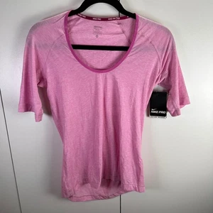 Neu mit Etikett Nike Pro Damen mittelrosa Wettbewerb Basisschicht kurzärmliges Shirt sportlich - Bild 1 von 6
