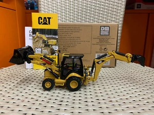 Retroexcavadora de pivote central de TI Caterpillar Cat 420E 1/50 DieCast Masters DM85143 - Imagen 1 de 10