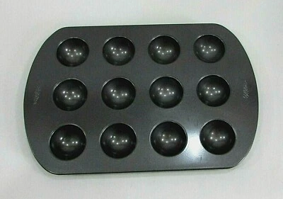 Molde de caramelo Wilton negro carbón antiadherente 1,75" fondo redondo? Pan Free S/H Foto 1 de 3