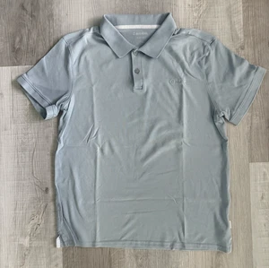 Nuevo sin etiquetas Camisa Polo Calvin Klein Liquid Touch Azul Para Hombre Talla M 100% Algodón Clásica - Imagen 1 de 7