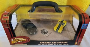 DIE CAST - NEW IN PACKAGE. JOHNNY LIGHTNING HEAD TO HEAD R1 2006 - Picture 1 of 11