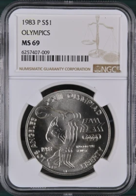 :1983 P $1-SILVER XXIII-OLYMPIC DISCUS COMMEMORATIVE NGC MS 69 R2 HIGHEST GRADES - Image 1 of 2