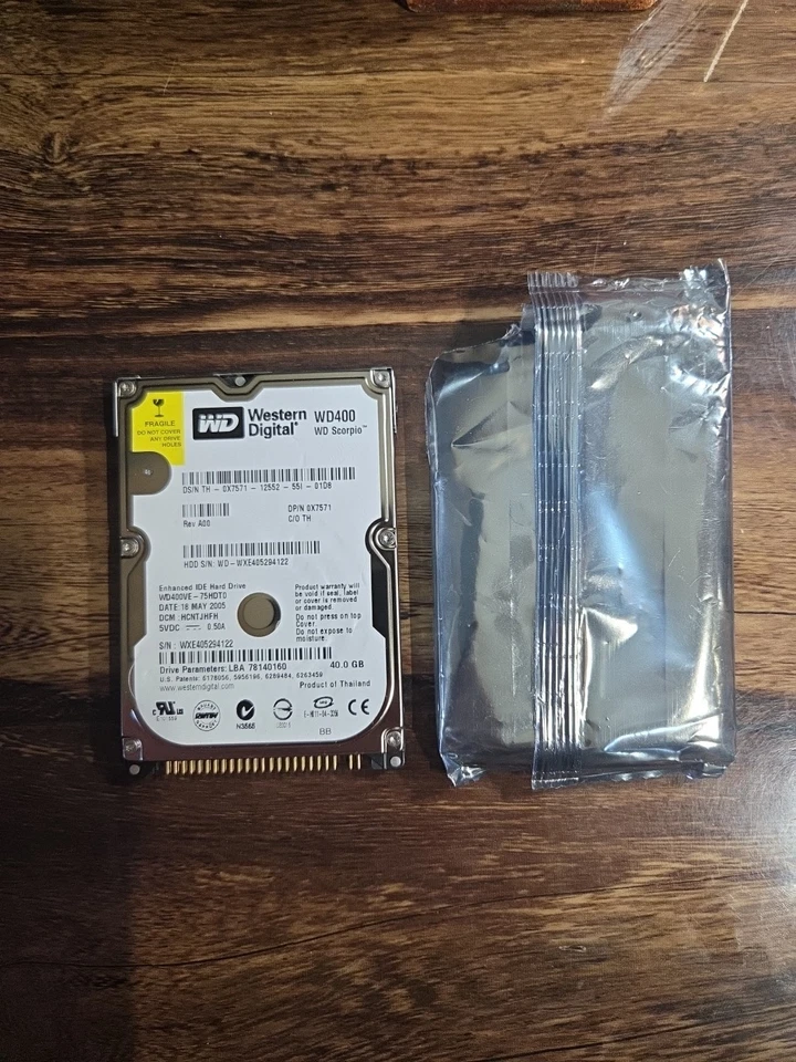 WD WD400VE-75HDT0 HCNTJHFH(WXE4) Thailand 40gb 2.5" IDE hard drive 18MAY2005 - Image 1 of 3