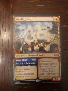 Scalding Viper -Showcase- WILDS OF ELDRAINE Regular Rare Snake WOE 295 mtg NM/M - Picture 1 of 1