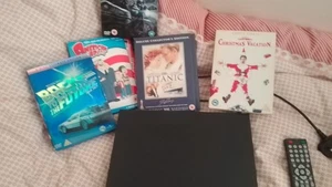 samsung dvd player plus dvds - Picture 1 of 4