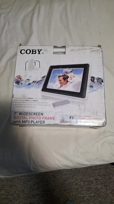 Coby DP-772 White 7" Inch Screen Digital Photo Frame with MP3 Player - Image 1 of 4