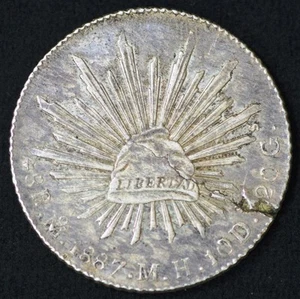 México 1887 8 reales, lunes MH, error de acuñación, planchet agrietado, KM# 377,10 - Imagen 1 de 2