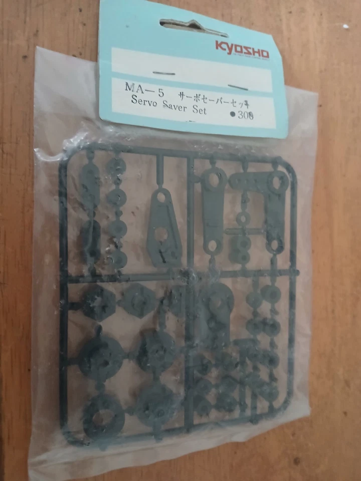 Vintage KYOSHO Maxxum ff servo saver parts & drive washer set new old rare - Image 1 of 1