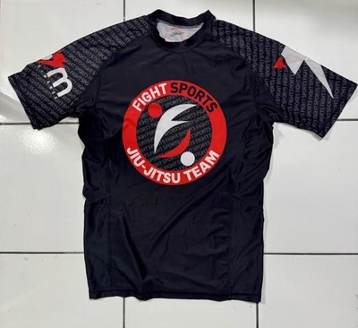 Camisa Storm Fight Sports Jiu Jitsu Team Rashguard Unisex Pequeña Negra BJJ MMA Foto 1 de 4